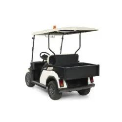 Toro Vista utility vehicle with an empty black cargo bed attachment for versatile transport capabilities