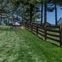 Ventrac Aera-Vator - The Ventrac effortlessly operates on slopes with the Aera-Vator attachment, seeding damaged areas of the lawn for revitalization.