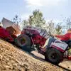 Ventrac 4520 and Seeder - Ventrac 4520 equipped with the EG520 spreading seed up a hill. Conquer slopes for seeding, mowing, and other tough jobs.