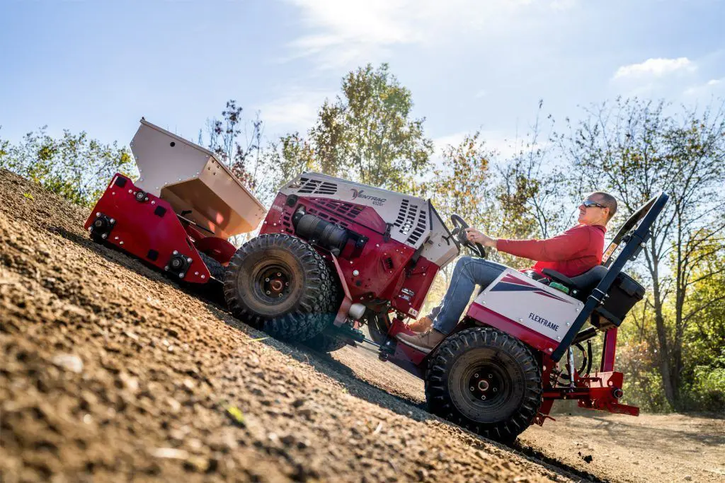 Ventrac 4520 and Seeder - Ventrac 4520 equipped with the EG520 spreading seed up a hill. Conquer slopes for seeding, mowing, and other tough jobs.