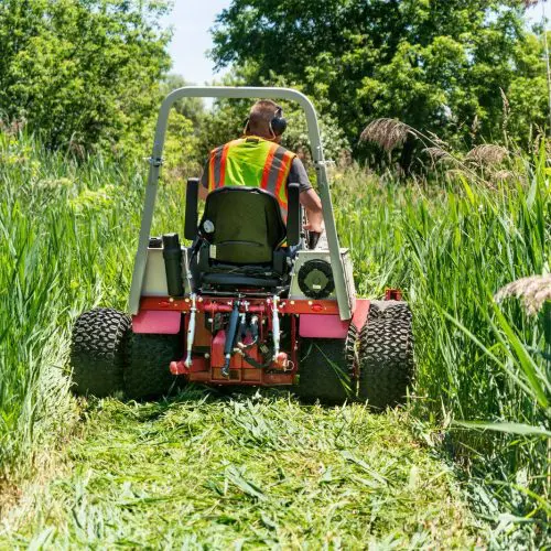 Ventrac Mowing down Grass