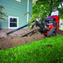 Trencher being used in backyard