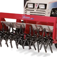 Red slitter/slicer tine kit attached to a Ventrac EB480 aerator, showcasing multiple sharp tines