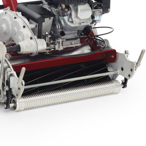Close-up of a Toro mower's 11-blade cutting unit, showcasing its engine and precision cutting components
