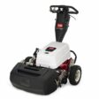 Electric walk-behind mower with a white and red body, showcasing the cutting deck and control handle