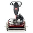 Front view of a Toro Greensmaster 1021 mower showcasing its engine and cutting components