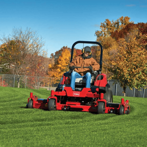 A Toro 7500-D 244cm Mower in a park mowing the grass.