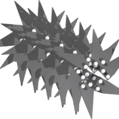 Close-up of sharp, metallic slitter/slicer tines arranged in a staggered pattern for aeration use