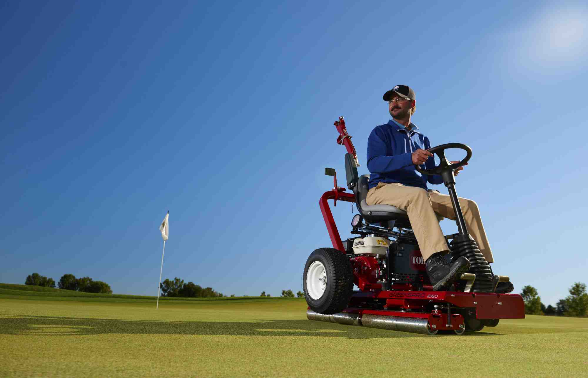 Rolling the golf green