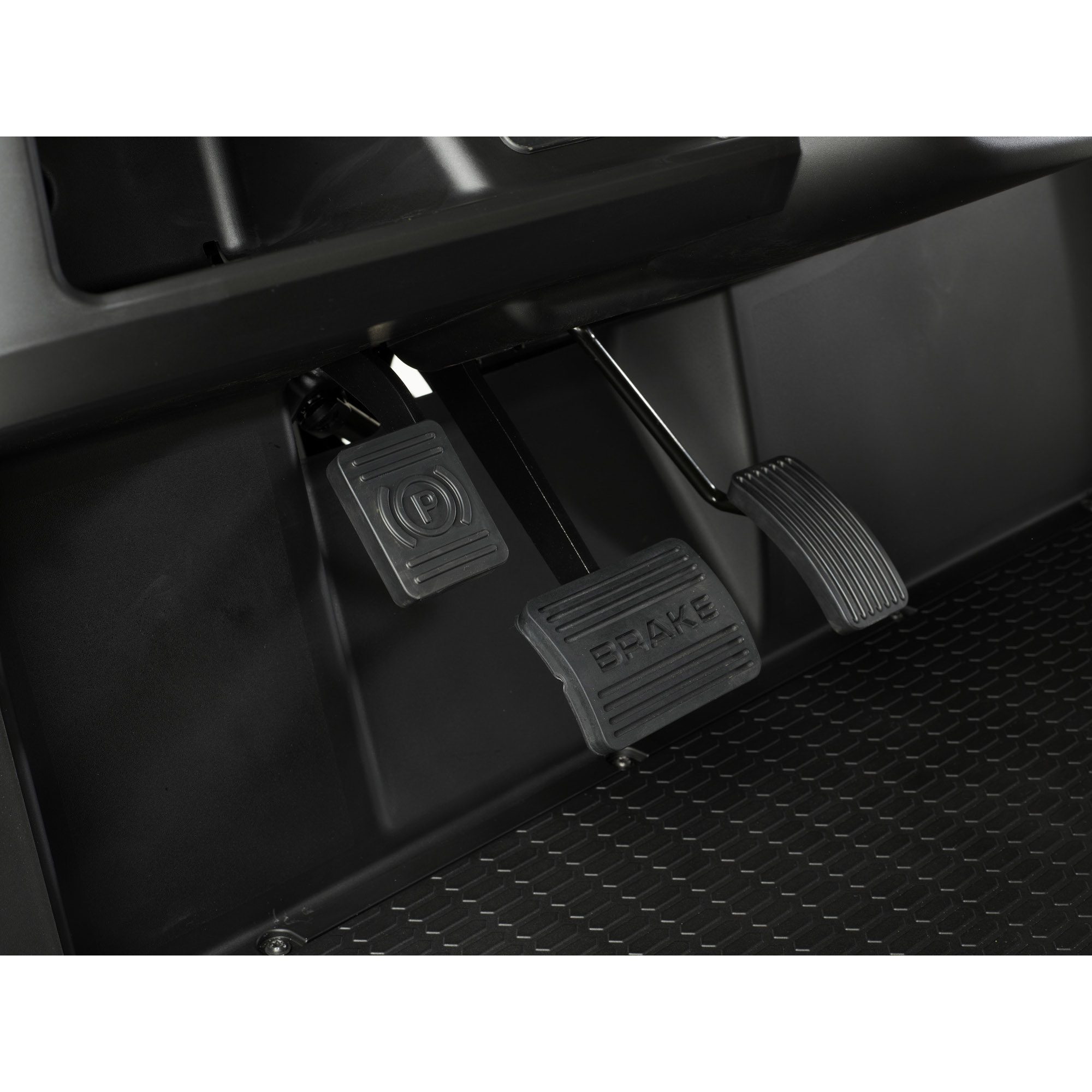 Toro Vista PTV close-up of pedals with brake and parking brake Detailed view of the Toro Vista PTV foot pedals, including a close-up of the parking brake, brake, and accelerator, designed for safe and efficient operation