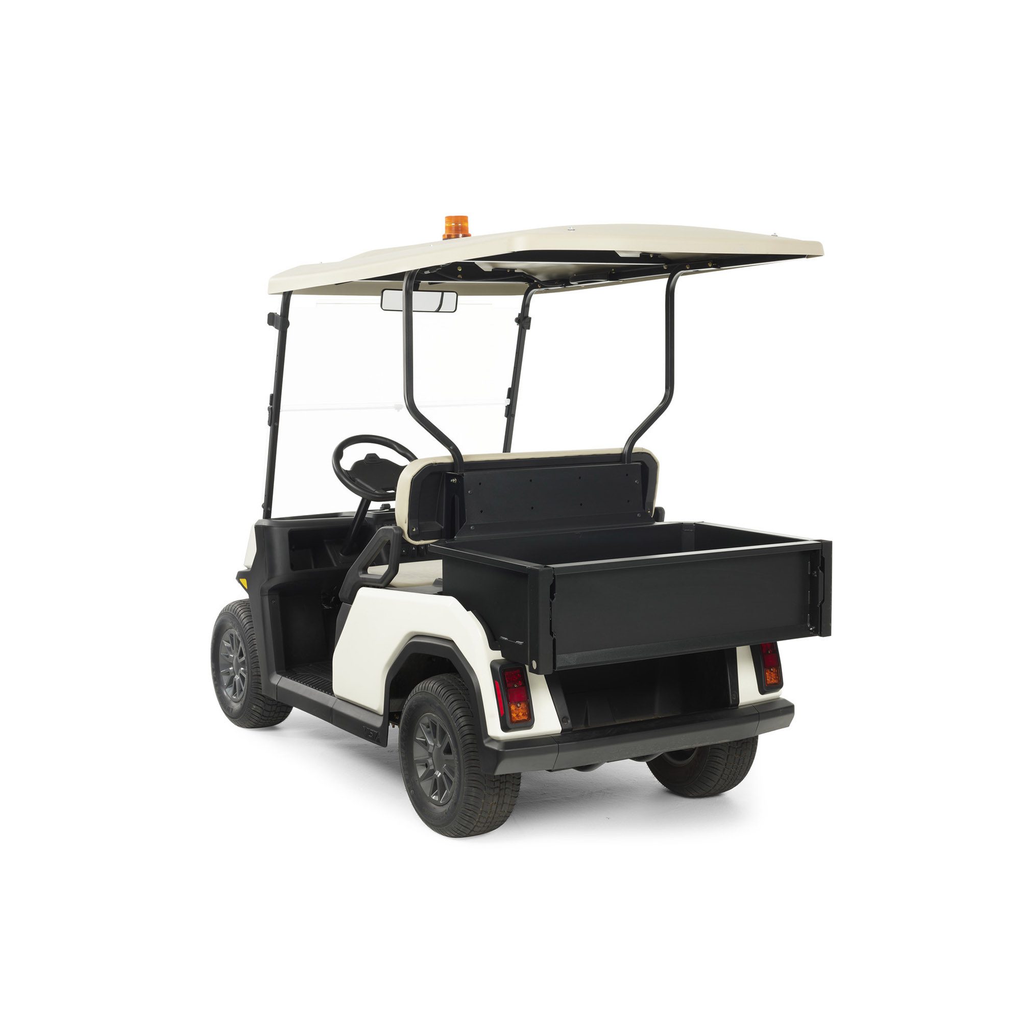 Toro Vista utility vehicle with cargo bed attachment Toro Vista utility vehicle with an empty black cargo bed attachment for versatile transport capabilities