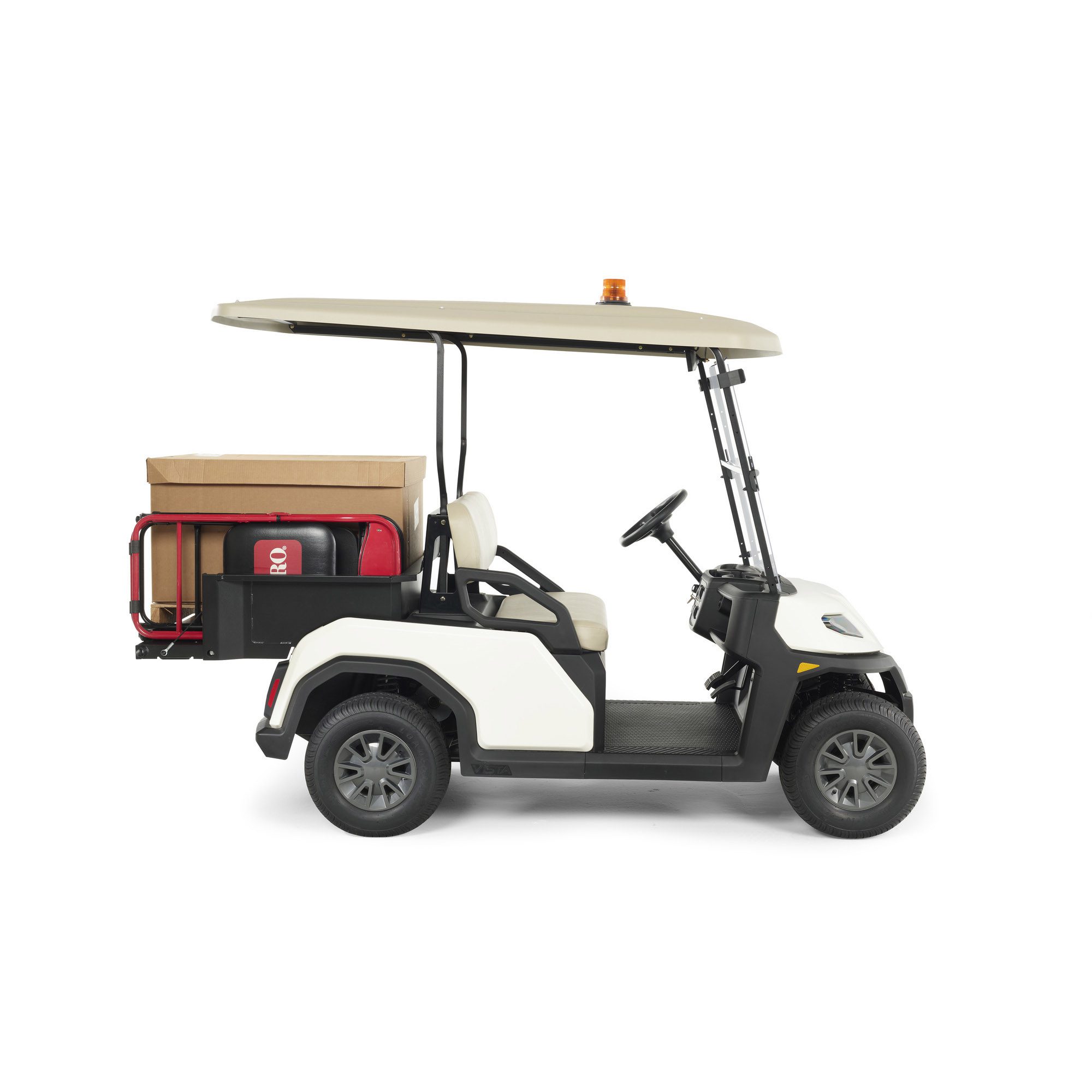 Toro Vista utility vehicle side view with cargo bed attachment Utility-focused Toro Vista vehicle side view featuring a black cargo bed attachment for efficient hauling