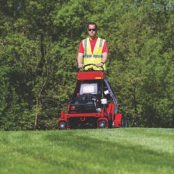 Contractor-using-stand-on-aerator action 2 sq