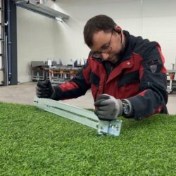 Cutting tool for circular cutting in artificial turf.