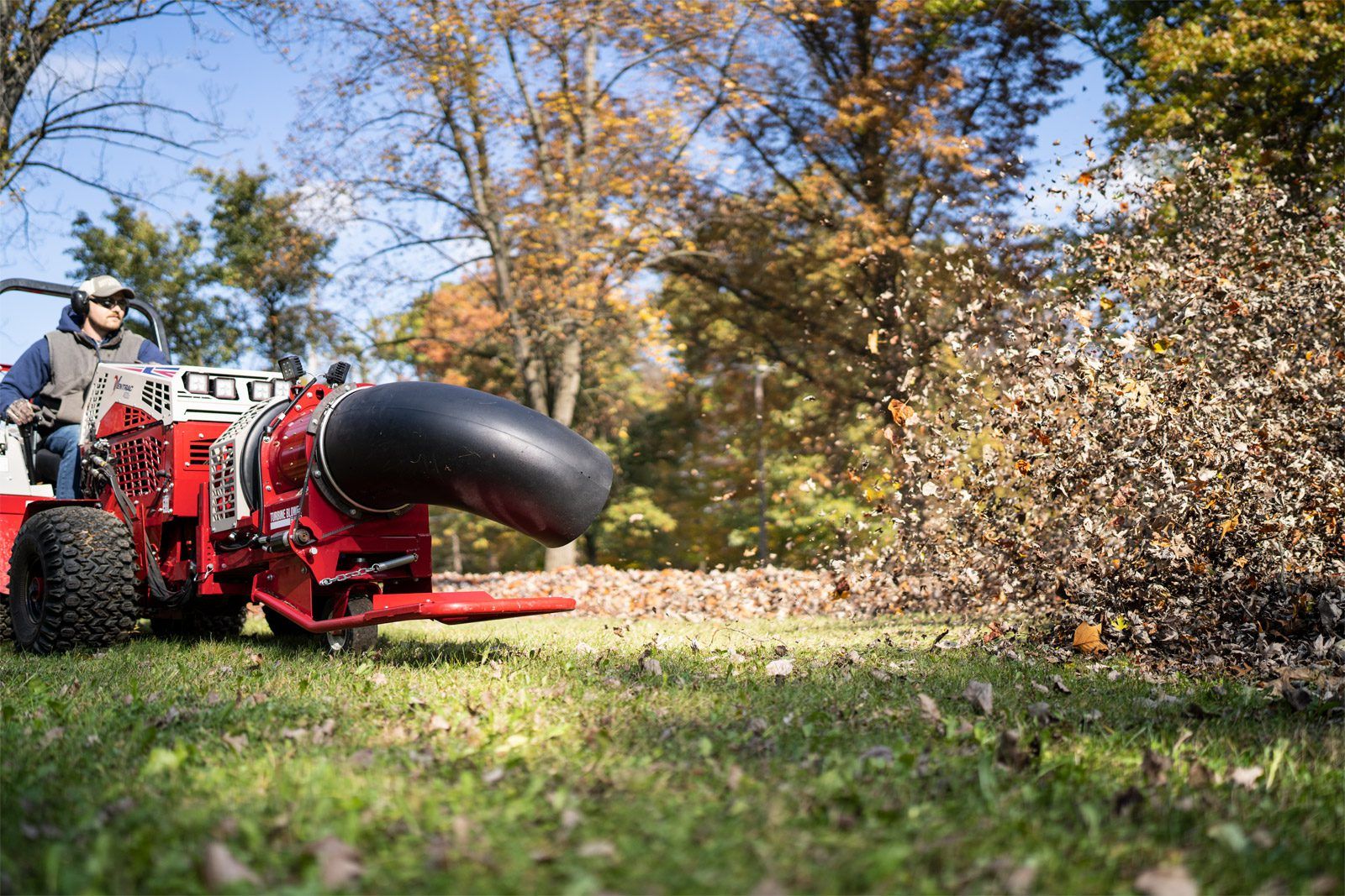 ET202 Ventrac Turbine Blower Attachment Ventrac Turbine Blower Attachment - blowing leaves in a public park