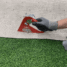 Artificial grass edge trimmer cutting