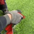 Artificial Grasscutter cutting grass