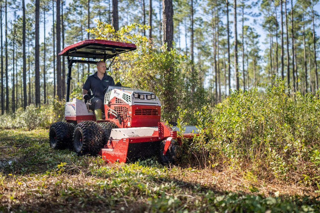 Ventrac Tough Cut Mower Attachment - cutting through forest bushes