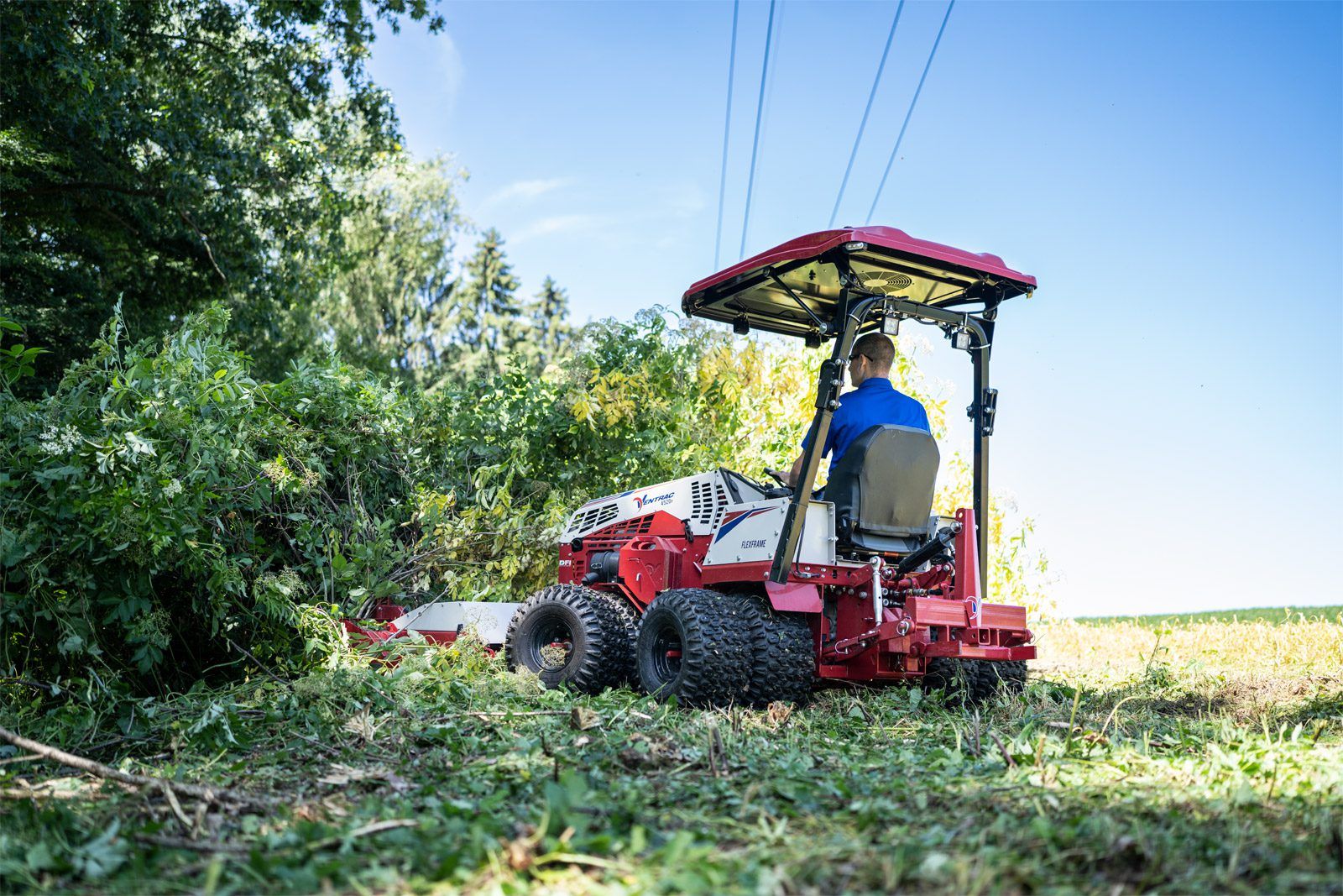 Ventrac Tough Cut Mower Attachment - cutting through bushes