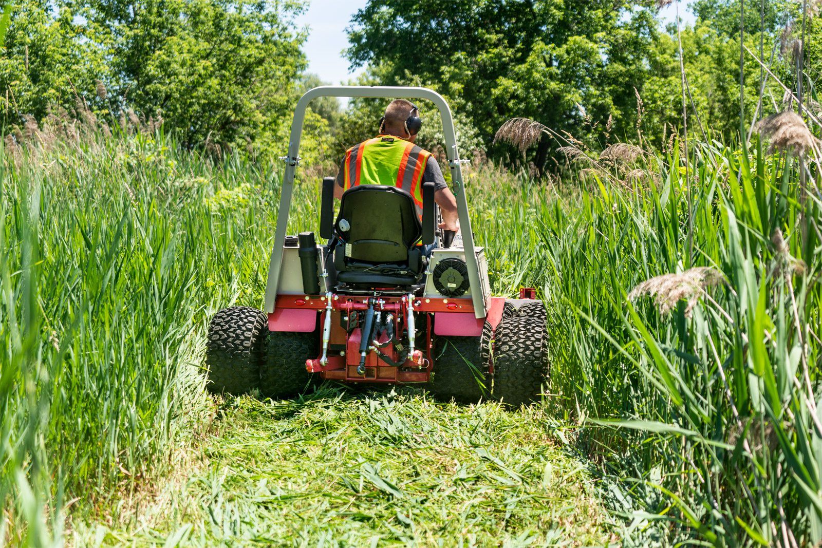 Ventrac Mowing down Grass