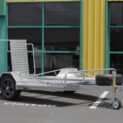A low-deck trailer with a light ramp, mag wheels, and a Duo-Fit coupling for golf cart transport