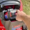 Inserting 6.0Ah battery into mower