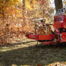 Ventrac Leaf Blower Tractor Attachment - close up of leaves blowing
