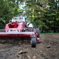 Ventrac Power Rake Tractor Attachment - out in a park
