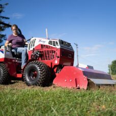 Ventrac Tiller Tractor Attachment - lifestyle image in green field
