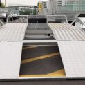 Low-deck trailer with a light ramp, mag wheels, and Duo-Fit coupling for transporting golf carts