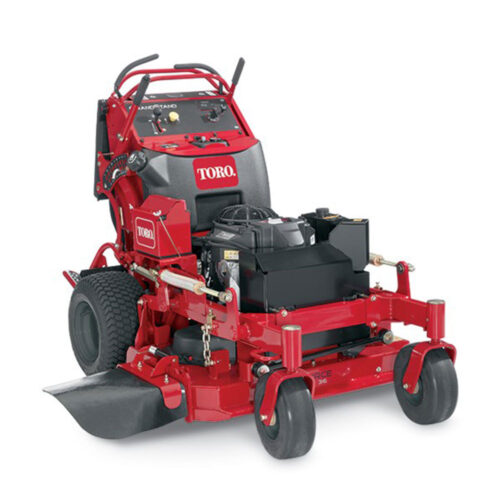 Red Toro stand-on mower with a robust design, featuring a large cutting deck and comfortable controls
