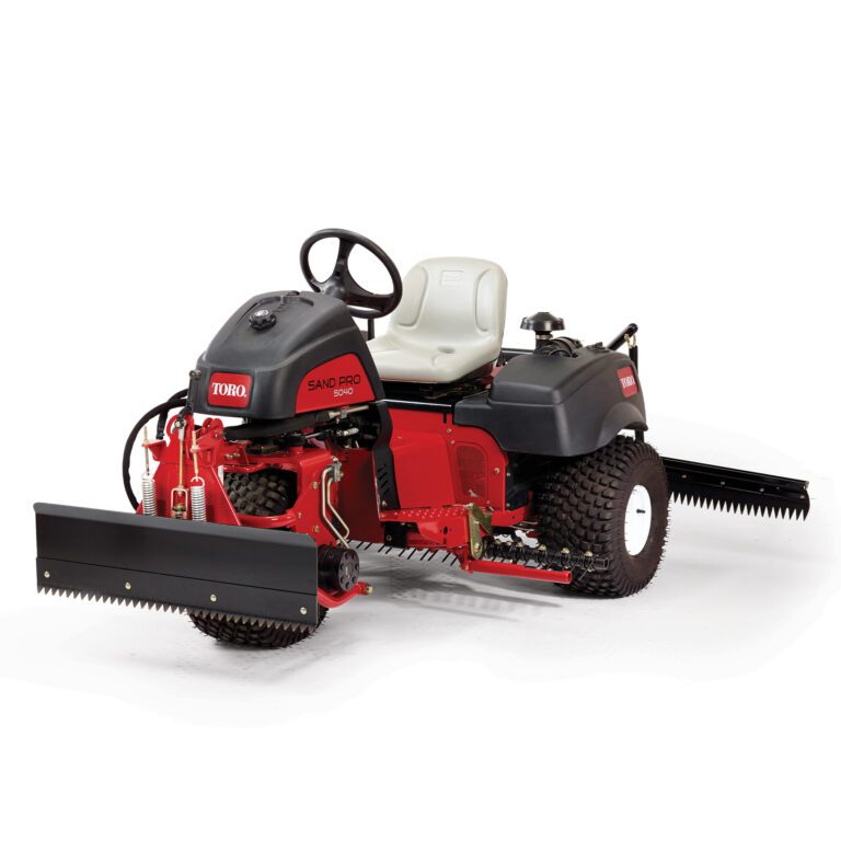 Red and black ride-on sand rake with large front blade and rear grooming attachments
