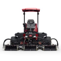 Front view of a Toro ride-on mower showcasing cutting units and operator seat in red and black