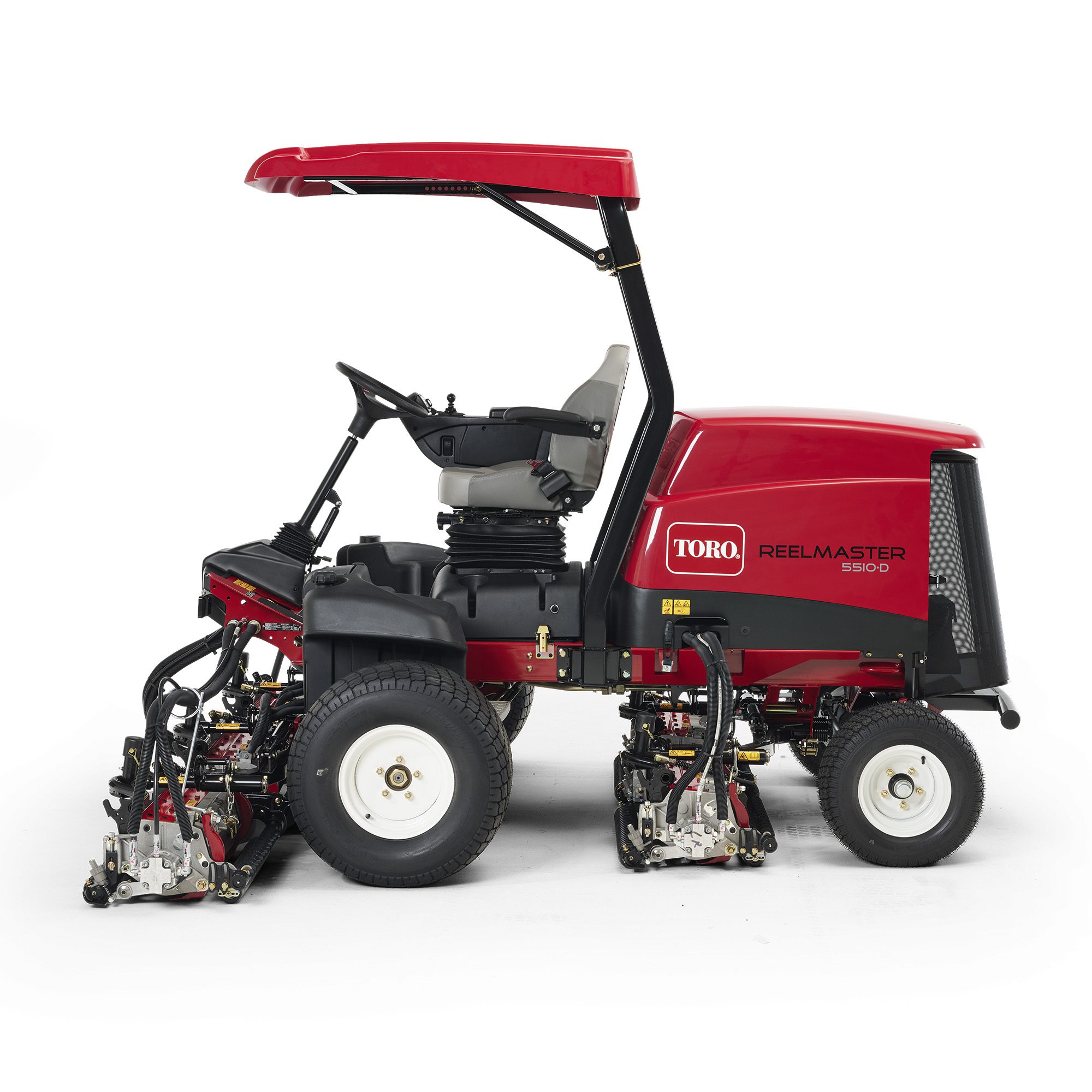 prodimg3 Side view of a red Toro ride-on mower showcasing cutting units and operator seat