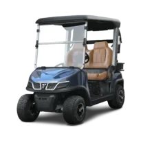A sleek electric golf cart with a navy body and tan seats, showcasing luxury and ergonomic design