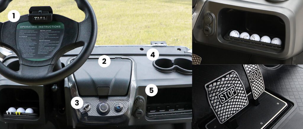 Interior view of a vehicle dashboard showing steering wheel, storage compartment, and control switches