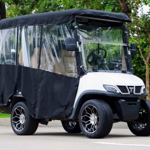 A white roadster with a black weather enclosure, featuring clear panels and stylish wheels